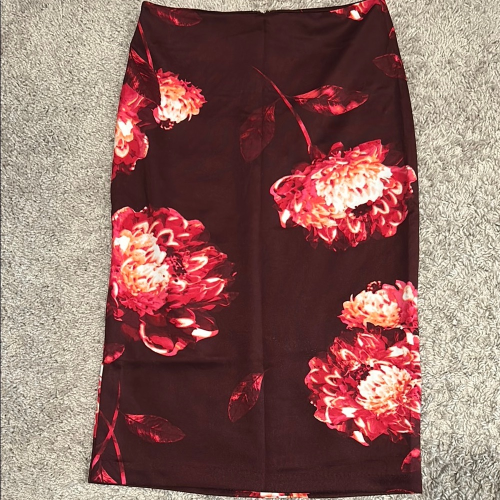 Floral pencil Skirt-size 0. Burgundy w/ pink flowers. Zip up back w/ bottom slit